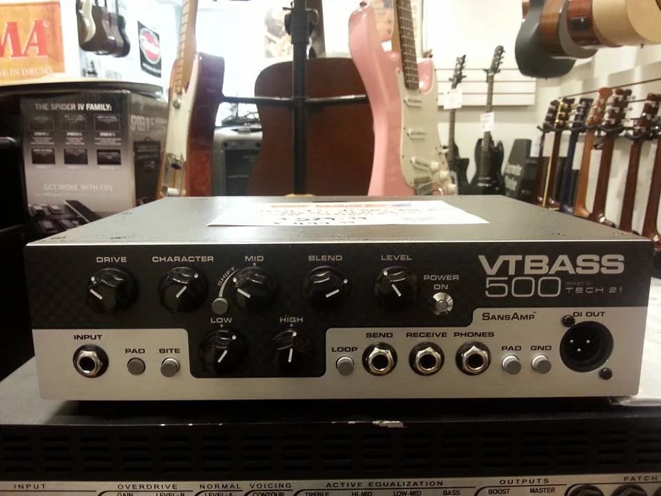 A bass and Tech 21 amp head set up at Big Island Guitars